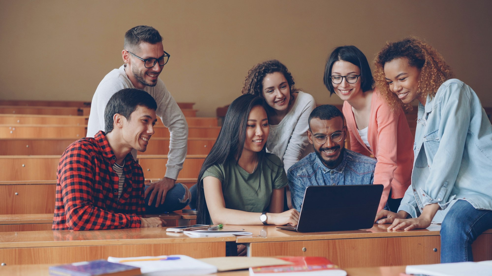 Students collaborating at a college campus.